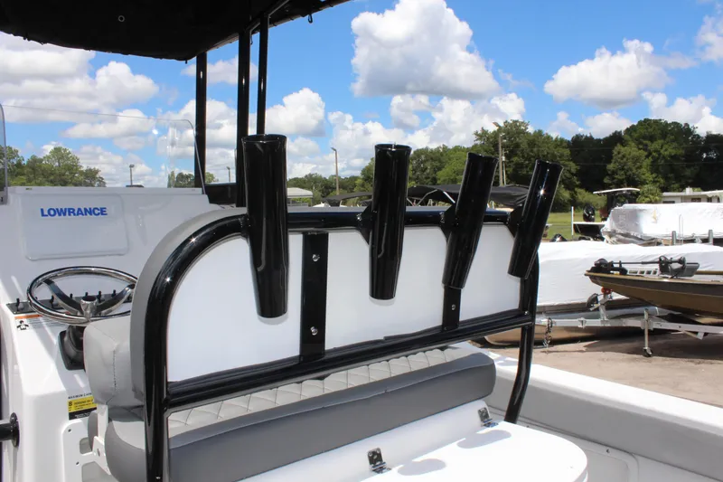 Slide: The Image of 2024 Clearwater 2200 WI Center Console boat with rod holders and Lowrance equipment. - 9