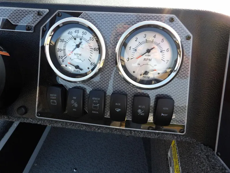 Slide: The Image of Dashboard of 2025 Lund 1775 Adventure SS with speedometer and RPM gauges. - 15