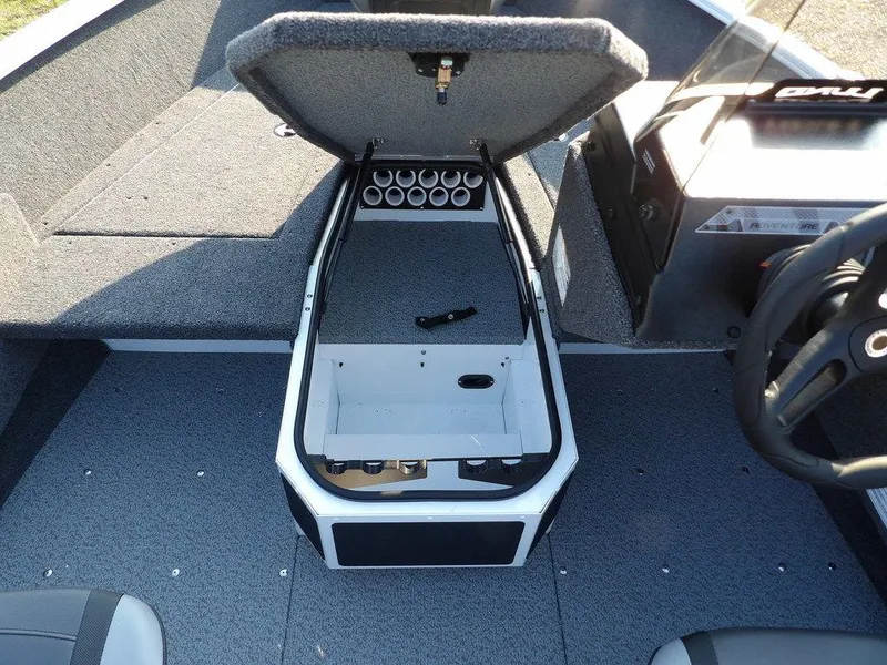 Slide: The Image of 2025 Lund 1775 Adventure SS boat interior with open storage compartment. - 38