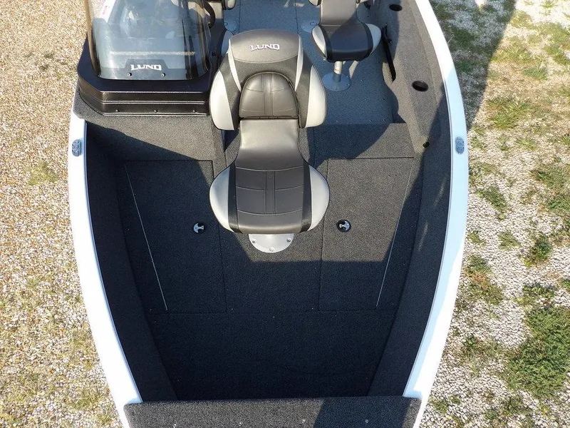 Slide: The Image of 2025 Lund 1775 Adventure SS boat interior with seating and console. - 40