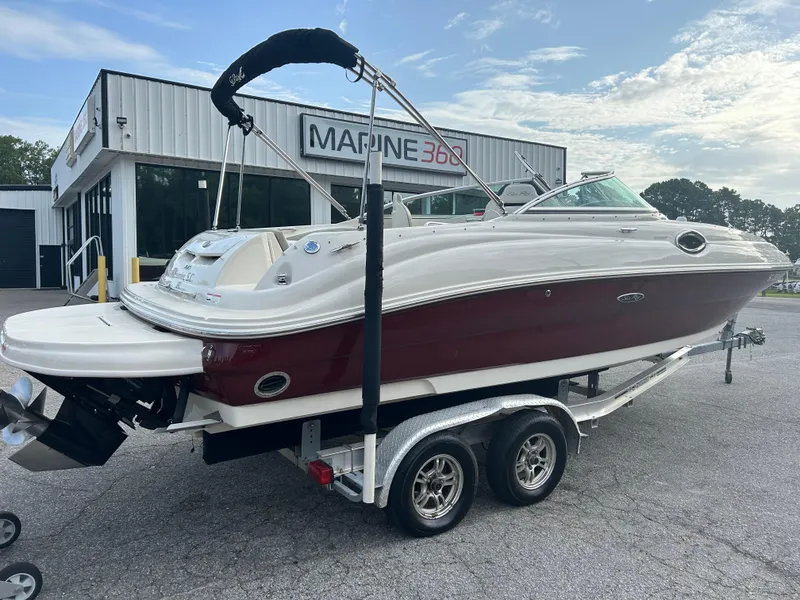 Slide: The Image of 2007 Sea Ray 240 Sundeck boat on trailer outside Marine 360 dealership. - 15