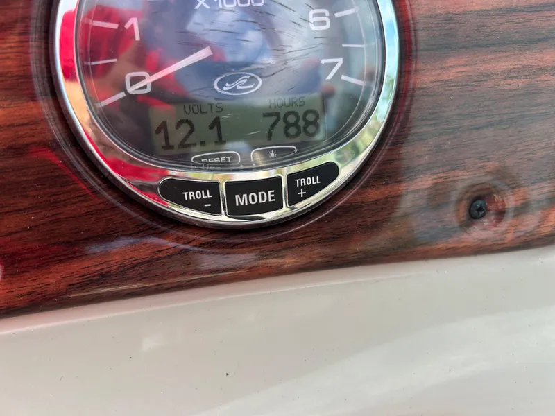 Slide: The Image of Close-up of 2007 Sea Ray 240 Sundeck dashboard showing volts and engine hours. - 16