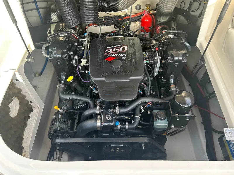 Slide: The Image of Engine compartment of a 2007 Sea Ray 240 Sundeck with MerCruiser 350 MAG MPI engine. - 17