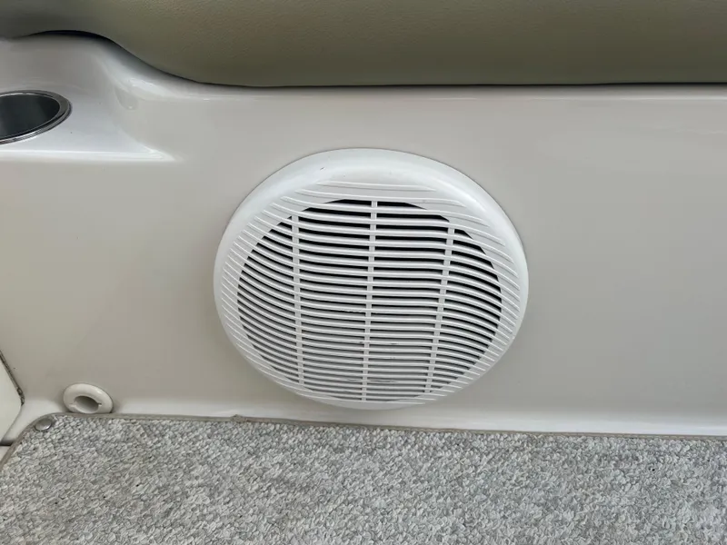 Slide: The Image of White speaker on 2007 Sea Ray 240 Sundeck boat interior panel. - 9