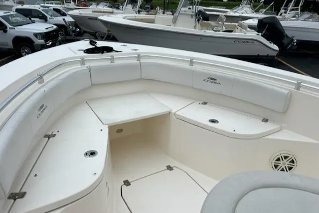 Slide: The Image of 2020 Cobia 237 Center Console boat with spacious seating and storage. - 7