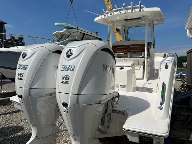 Slide: The Image of 2025 Pursuit S 288 Sport boat with dual Yamaha 300 V6 engines. - 1