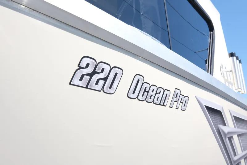 Slide: The Image of 2025 Hewescraft 220 Ocean Pro ET HT boat exterior close-up. - 5