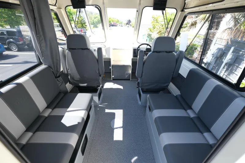 Slide: The Image of Interior of 2025 Hewescraft 220 Ocean Pro ET HT boat with gray seating. - 8