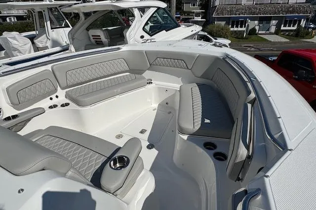 Slide: The Image of 2026 Pursuit S 328 Sport boat with spacious seating and modern design. - 26