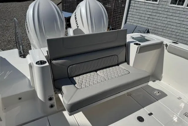 Slide: The Image of 2026 Pursuit S 328 Sport boat with Yamaha engines and cushioned seating. - 7