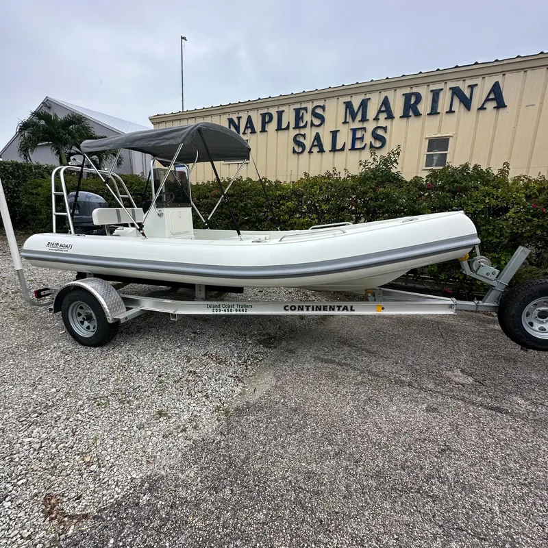 Slide: The Image of 2024 Rigid Boats 17' Sport on trailer at Naples Marina Sales. - 1