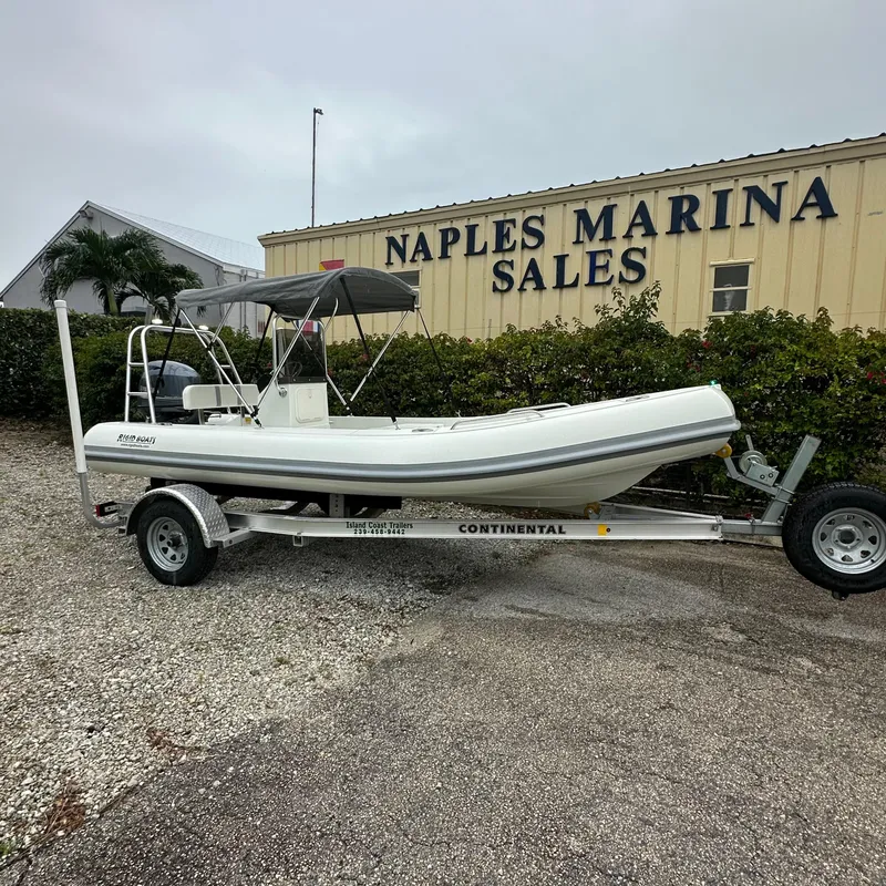 Slide: The Image of 2024 Rigid Boats 17' Sport at Naples Marina Sales on trailer. - 16