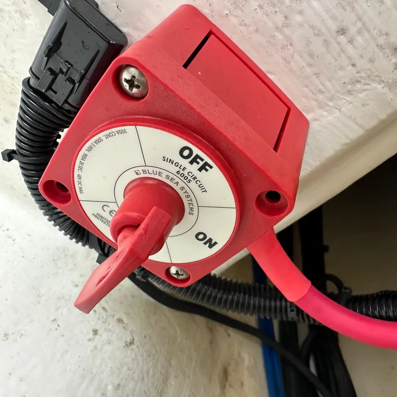 Slide: The Image of Red battery switch on 2024 Rigid Boats 17' Sport. - 18