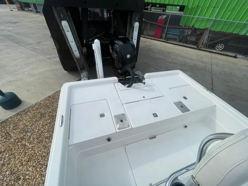 Slide: The Image of 2005 ShearWater 2200 boat with outboard motor, viewed from the rear deck. - 8