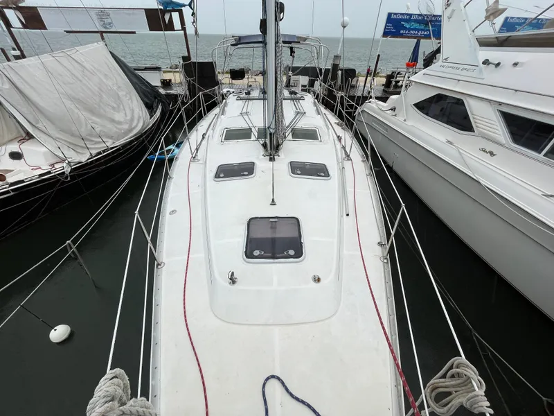 Slide: The Image of 2005 Beneteau Oceanis Clipper 373 sailboat docked at marina, top view. - 3
