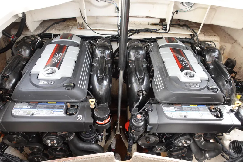 Slide: The Image of Twin engines of a 2017 Sea Ray SLX 310 boat, showcasing powerful 350 horsepower. - 20