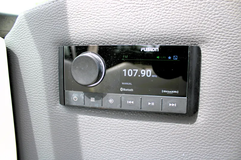Slide: The Image of Fusion stereo system in 2023 Regal LX6, displaying FM 107.90 MHz. - 31