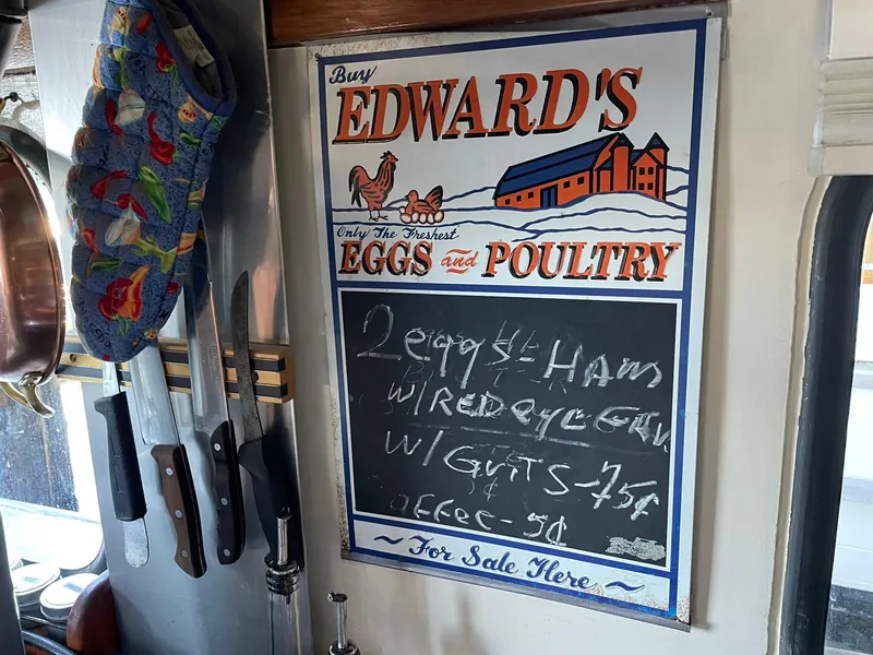 Slide: The Image of Vintage 1940 Tacoma Boat Co Cruiser interior with retro Edward's Eggs and Poultry sign. - 13