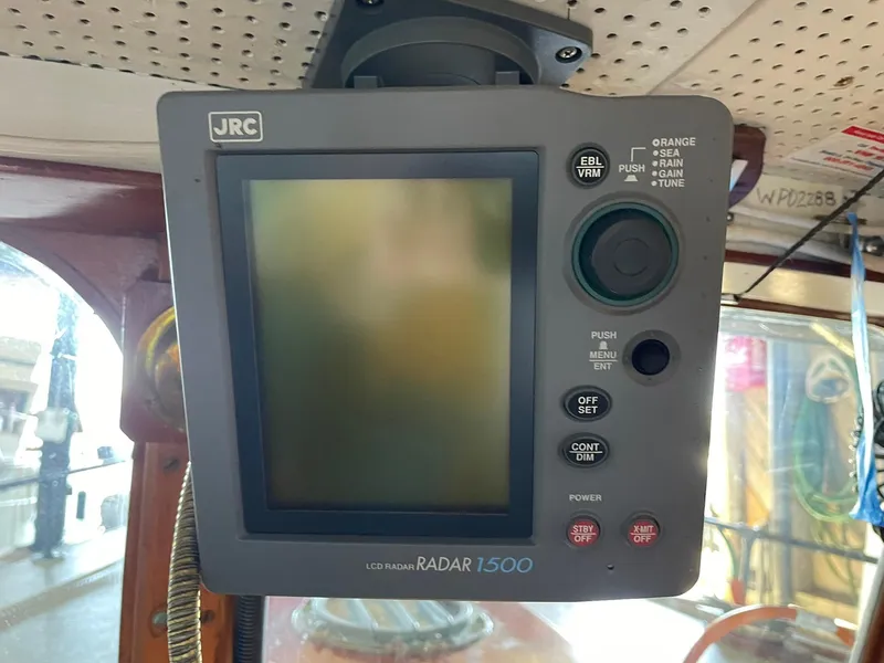 Slide: The Image of JRC Radar 1500 on 1940 Historic Tacoma Boat Co Cruiser, mounted on cabin ceiling. - 22