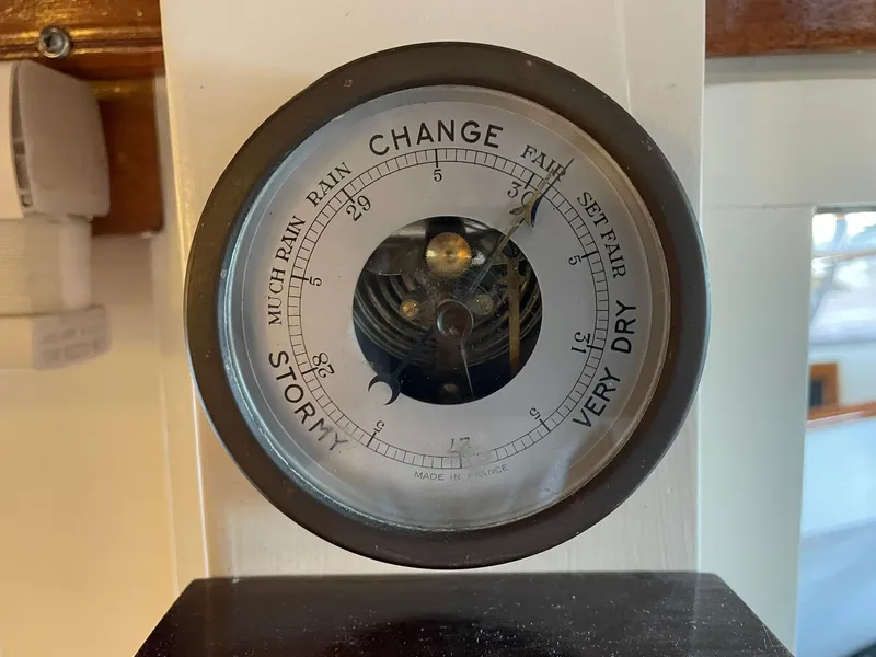Slide: The Image of Barometer on 1940 Historic Tacoma Boat Co Cruiser, indicating weather changes. - 36