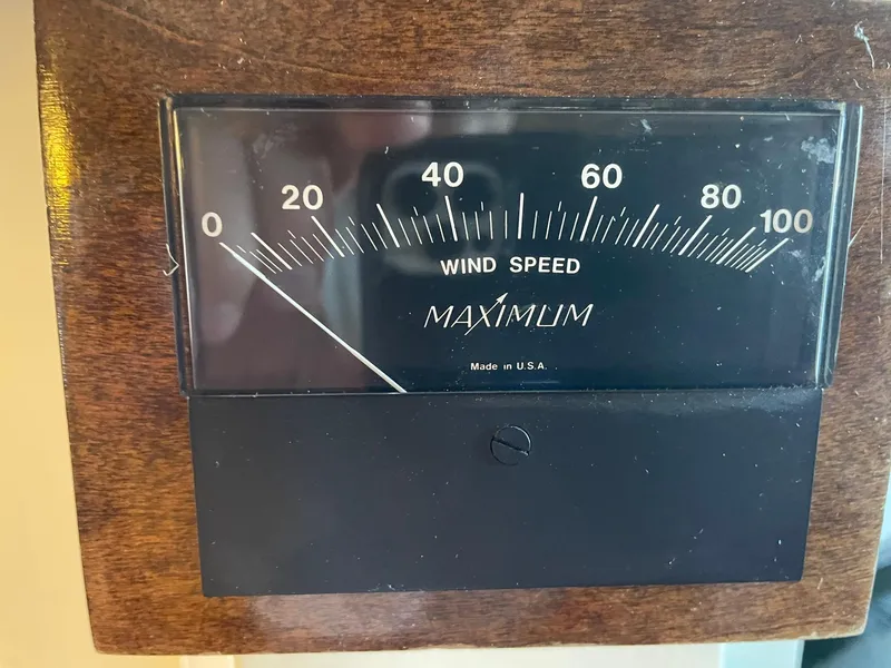 Slide: The Image of Wind speed gauge on 1940 Historic Tacoma Boat Co Cruiser, displaying "Maximum" reading. - 37