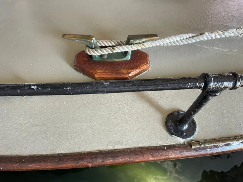 Slide: The Image of 1940 Historic Tacoma Boat Co Cruiser deck with cleat and rope detail. - 47