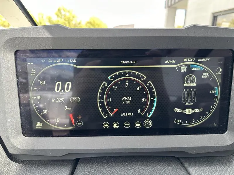 Slide: The Image of Dashboard display of 2023 Malibu 22 LSV boat showing RPM and speed. - 10
