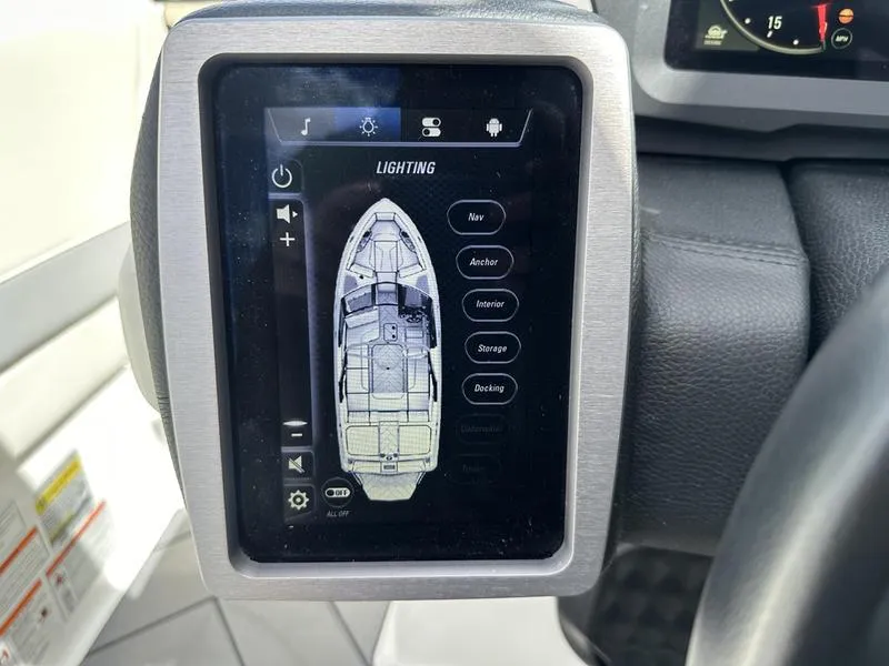 Slide: The Image of 2023 Malibu 22 LSV boat touchscreen display showing lighting controls. - 15