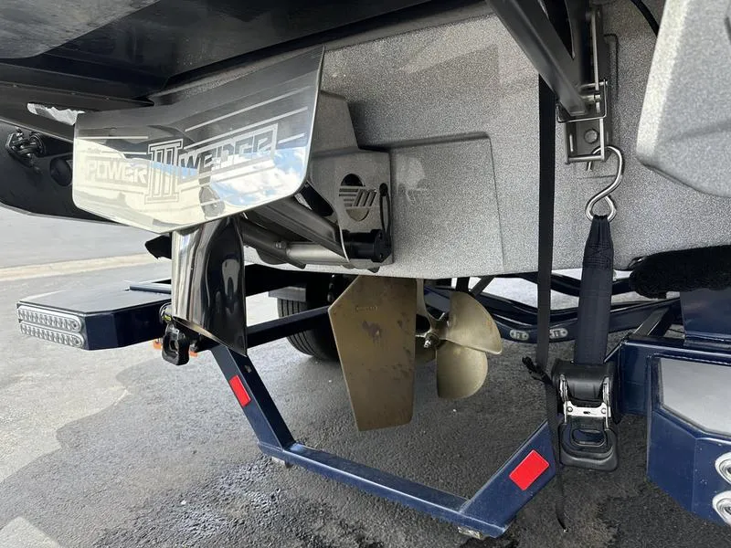 Slide: The Image of Close-up of 2023 Malibu 22 LSV boat propeller and Power Wedge III system. - 4