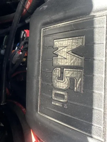 Slide: The Image of Close-up of a 2023 Malibu 22 LSV engine with "M5DI" label. - 6