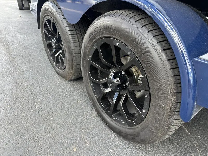 Slide: The Image of 2023 Malibu 22 LSV trailer with sleek black alloy wheels. - 7