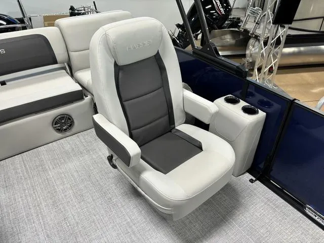 Slide: The Image of Luxury seating on 2025 Harris CRUISER 230 SLDH boat with cup holders. - 10