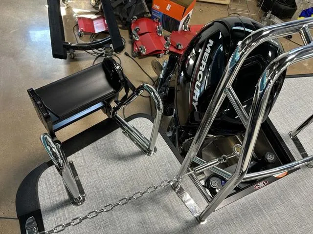 Slide: The Image of 2025 Harris CRUISER 230 SLDH boat with Mercury engine and stainless steel ladder. - 21