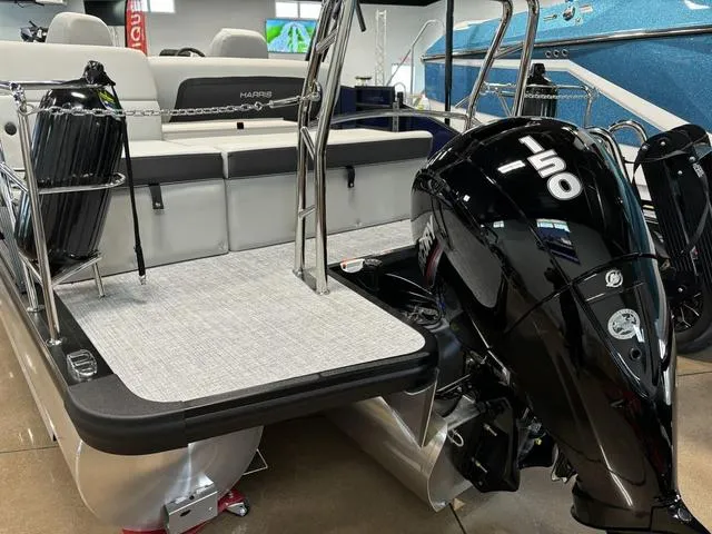 Slide: The Image of 2025 Harris CRUISER 230 SLDH pontoon boat with powerful 150 HP engine. - 22