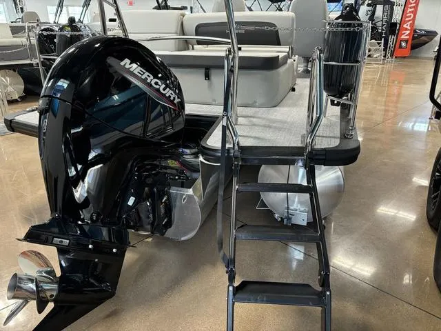 Slide: The Image of 2025 Harris CRUISER 230 SLDH with Mercury outboard motor and boarding ladder. - 23