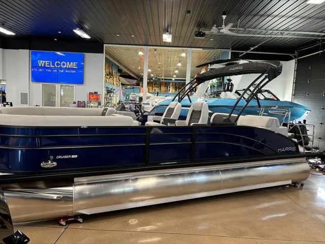 Slide: The Image of 2025 Harris CRUISER 230 SLDH pontoon boat displayed in showroom. - 3