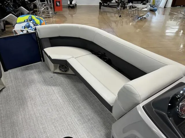 Slide: The Image of 2025 Harris CRUISER 230 SLDH interior with sleek seating and modern design. - 7