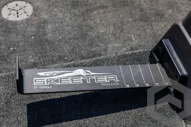 Slide: The Image of Skeeter ZXR 21 boat detail with measuring tool, 2025 model. - 39