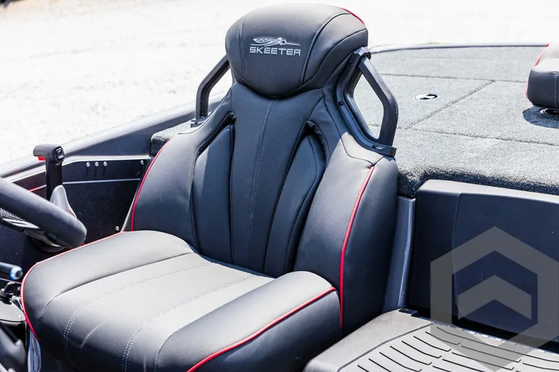 Slide: The Image of 2025 Skeeter ZXR 21 boat seat with black and red design, featuring ergonomic support. - 44