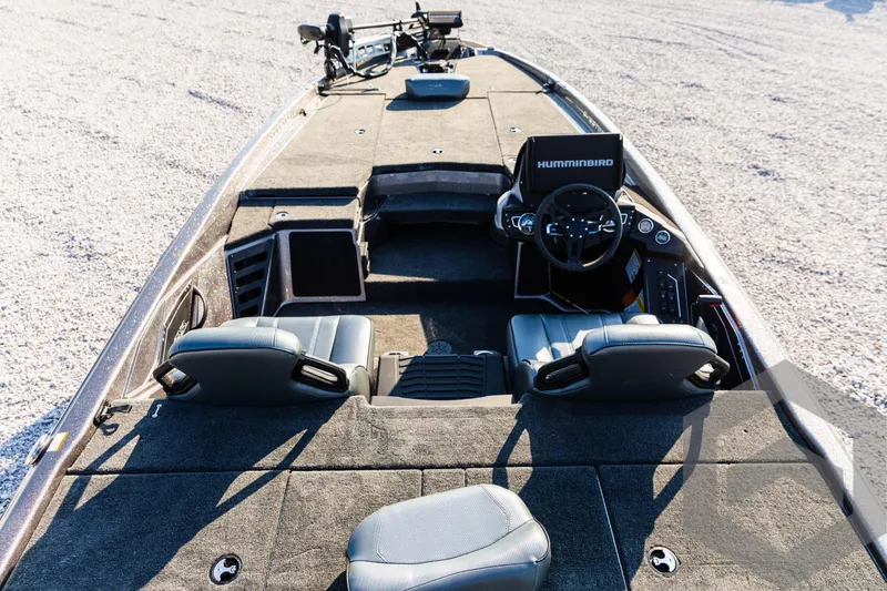 Slide: The Image of 2025 Skeeter ZXR 20 boat interior with dual seats and advanced navigation system. - 27