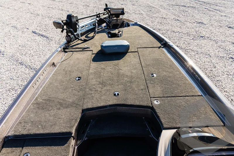 Slide: The Image of 2025 Skeeter ZXR 20 boat deck with advanced fishing equipment. - 28
