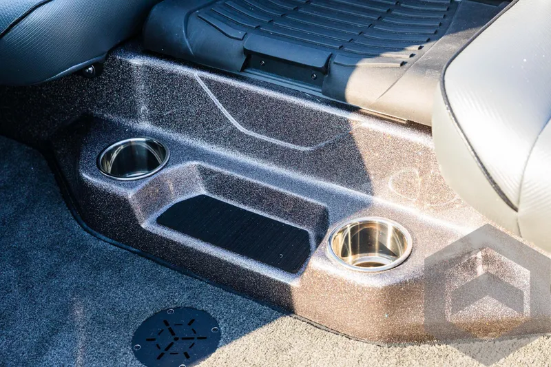 Slide: The Image of Interior of 2025 Skeeter ZXR 20 boat with cup holders and seating area. - 44