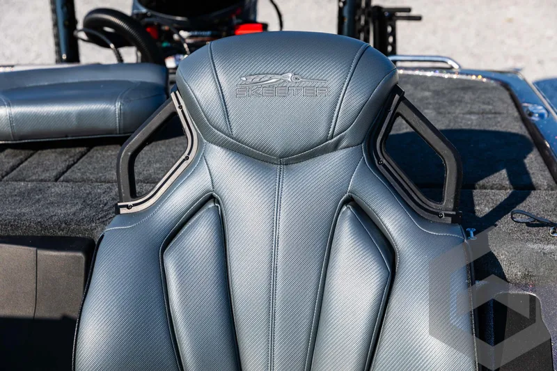 Slide: The Image of 2025 Skeeter ZXR 20 boat seat with sleek, modern design and textured upholstery. - 46