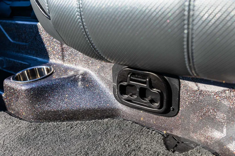 Slide: The Image of 2025 Skeeter ZXR 20 interior detail with cup holder and seat adjustment. - 49