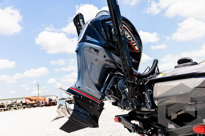 Slide: The Image of 2025 Skeeter ZXR 20 boat motor under a clear blue sky. - 16