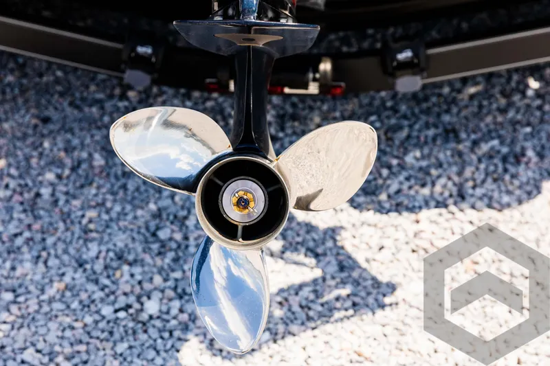 Slide: The Image of Skeeter ZXR 20 boat propeller, 2025 model, on gravel surface. - 17