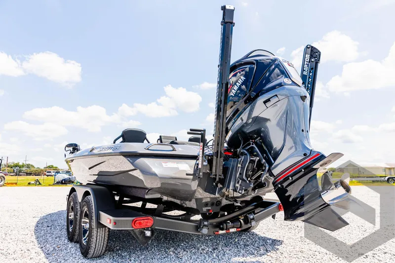 Slide: The Image of 2025 Skeeter ZXR 20 boat on trailer, rear view, sunny day. - 21