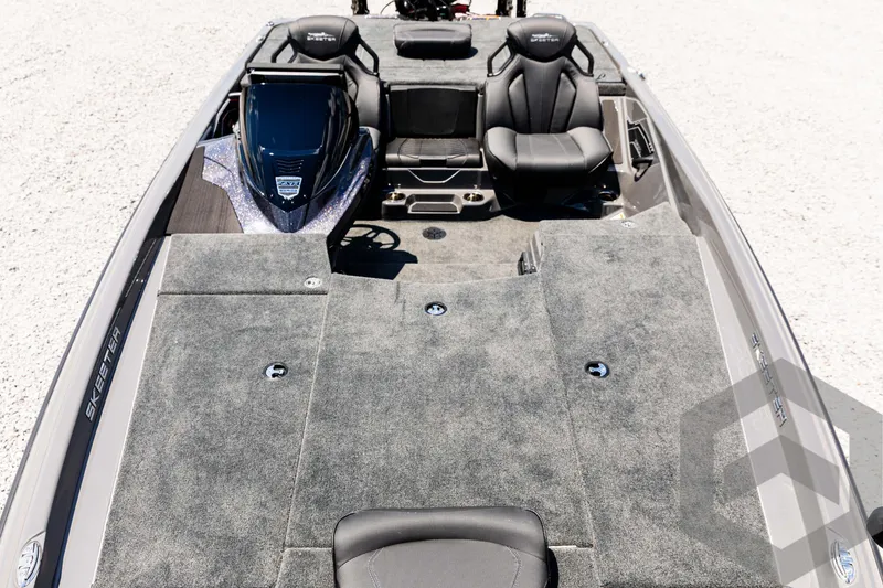 Slide: The Image of 2025 Skeeter ZXR 20 boat interior with spacious seating and carpeted deck. - 27