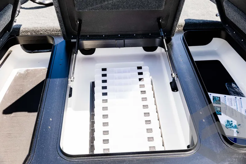 Slide: The Image of Open storage compartment in 2025 Skeeter ZXR 20 boat. - 31