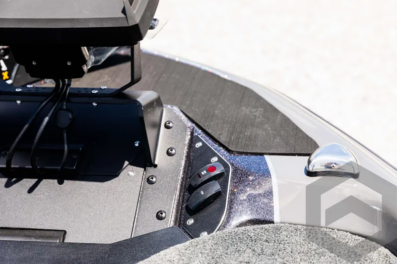 Slide: The Image of 2025 Skeeter ZXR 20 boat dashboard with control panel and sleek design. - 37